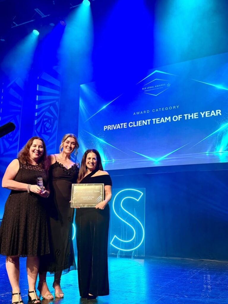 Photo showcasing Howell Jones celebrating winning at the SLS Legal Awards 2026.